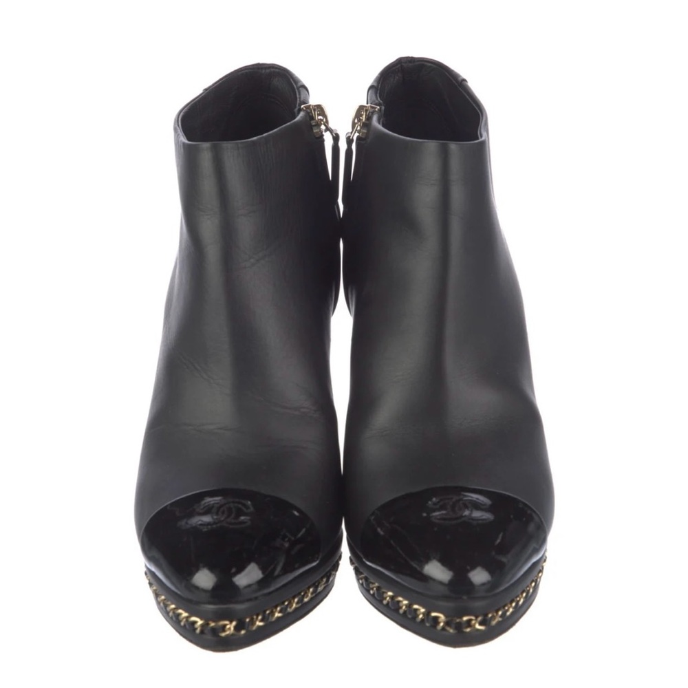 CHANEL Black Ankle Boots with Gold Accents